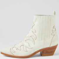 White cowboy boot with brown sole on a light gray background